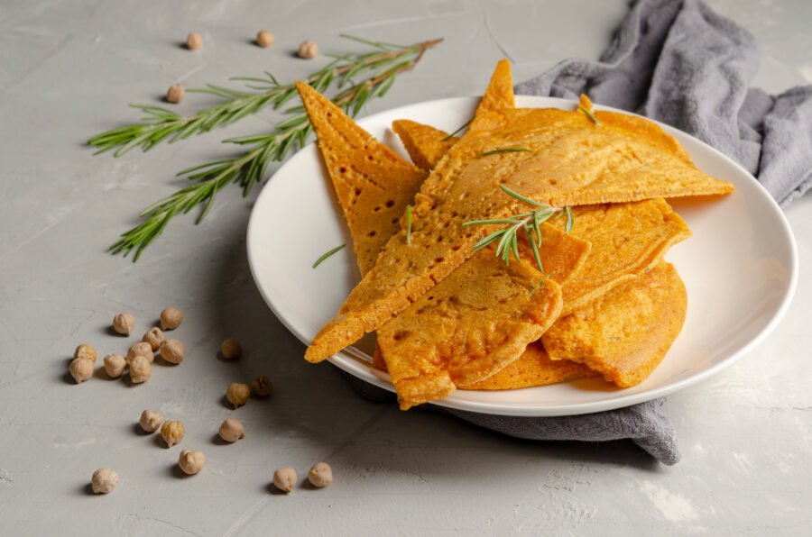 Freshly cooked Cecina chickpea flatbread