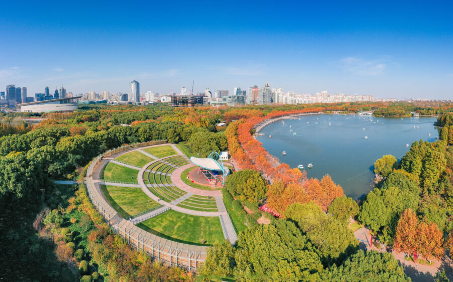 Aerial view of Century Park in Pudong New Area, Shanghai, showcasing lush greenery and park layout