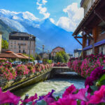 Panoramic view of the Arve River and Mont-Blanc massif from Chamonix, showcasing the stunning French alpine landscape.
