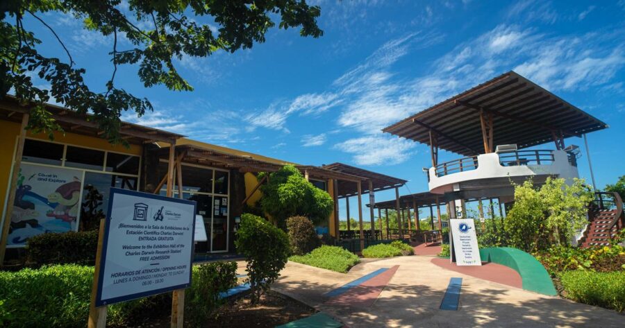 Modern community center with vibrant architecture, lush landscaping, and welcoming pathways.