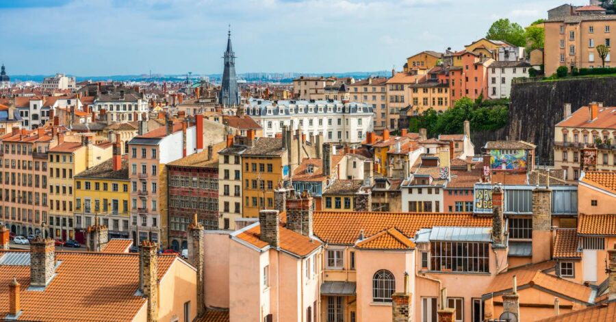 Panoramic cityscape of Croix-Rousse neighborhoods, showcasing urban skyline and architecture.