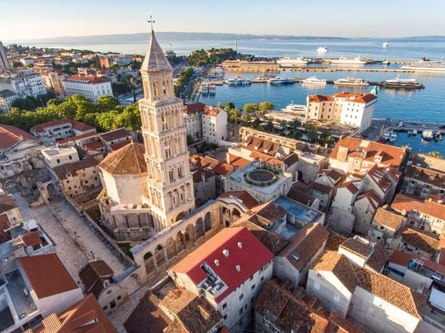 Aerial view of Split showcasing the Cathedral of Saint Domnius and the Adriatic coastline.