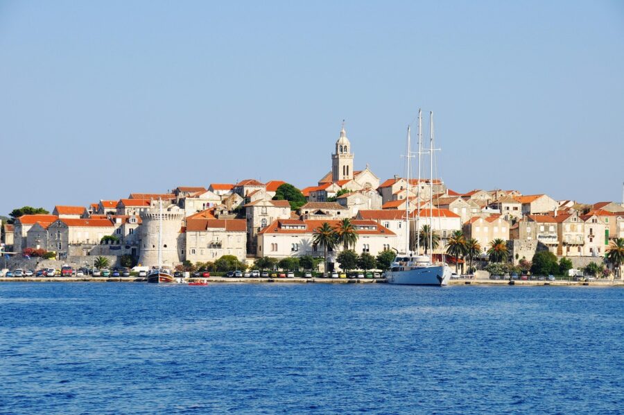Korčula, Croatia medieval old town harbor on the Adriatic with terracotta roofs.