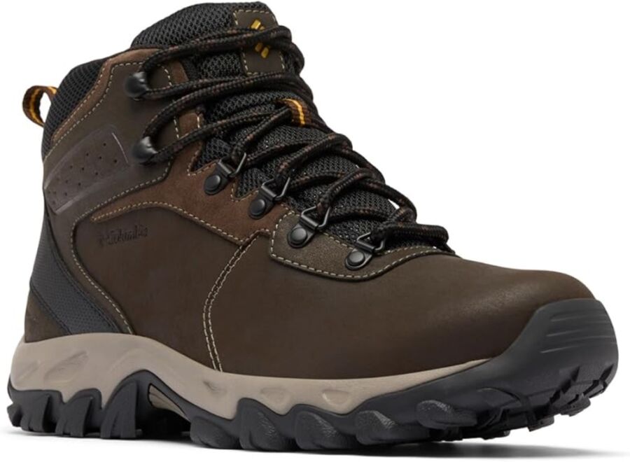 Brown Columbia Newton Ridge Plus II waterproof hiking boot displayed from the side, showcasing its rugged design and features.
