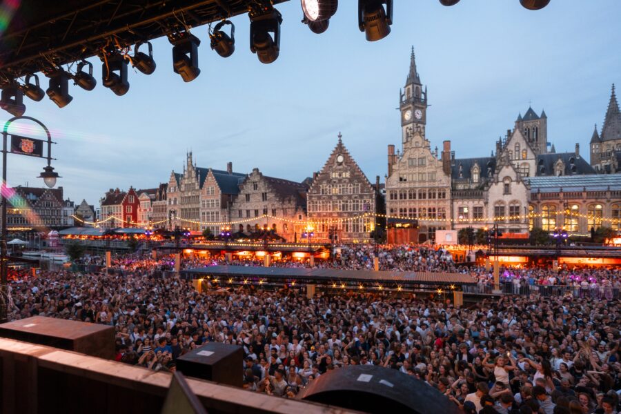 Gentse Feesten concert stage overlooking packed crowd in historic Ghent square.