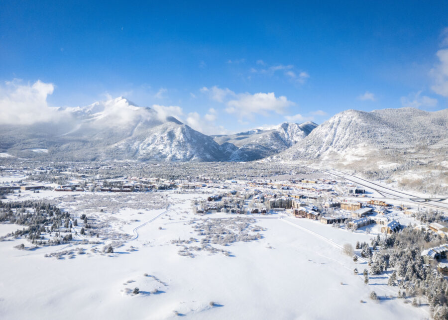  Aerial view of a snowy winter landscape at Copper Mountain, showcasing the serene beauty of the Colorado Rockies.