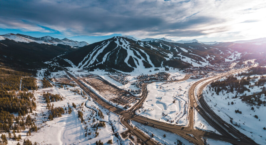 Aerial view of ski trails winding through snowy Copper Mountain, Colorado, showcasing winter sports and recreation activities.
