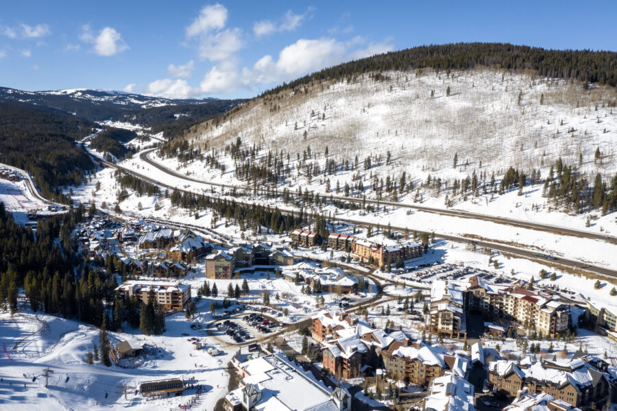 Aerial perspective of Copper Mountain, Colorado, highlighting winter sports and recreational activities on snow-covered terrain.