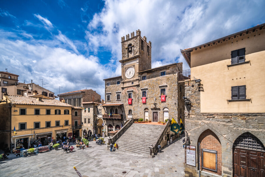 The old city hall stands prominently in Cortona's main square, showcasing Tuscany's rich history and architecture