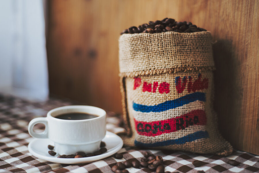 Mini sack filled with Costa Rican coffee beans, showcasing the rich texture and color of the beans inside