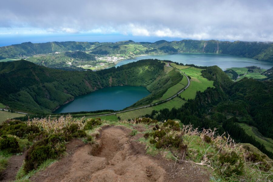 São Miguel Azores panoramic crater-lake overlook with twin teal lakes and green ridges.