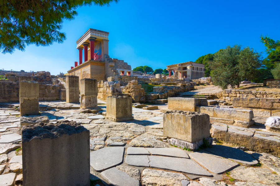 The North Entrance of the Palace in Knossos, featuring a vibrant fresco of a charging bull, located in Crete, Greece.