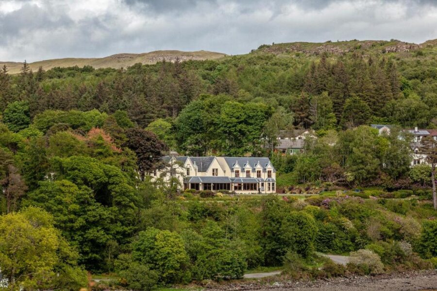 Scenic view of the Inner Hebrides, showcasing the rugged landscape and coastline of the Isle of Skye.
