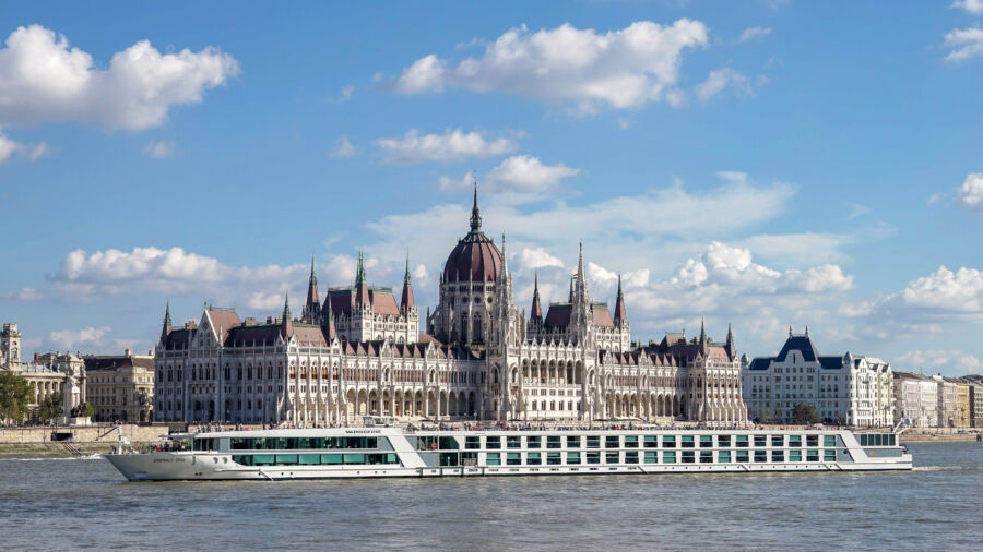 Scenic river cruise on the Danube River, showcasing Budapest's iconic landmarks and beautiful waterfront views  