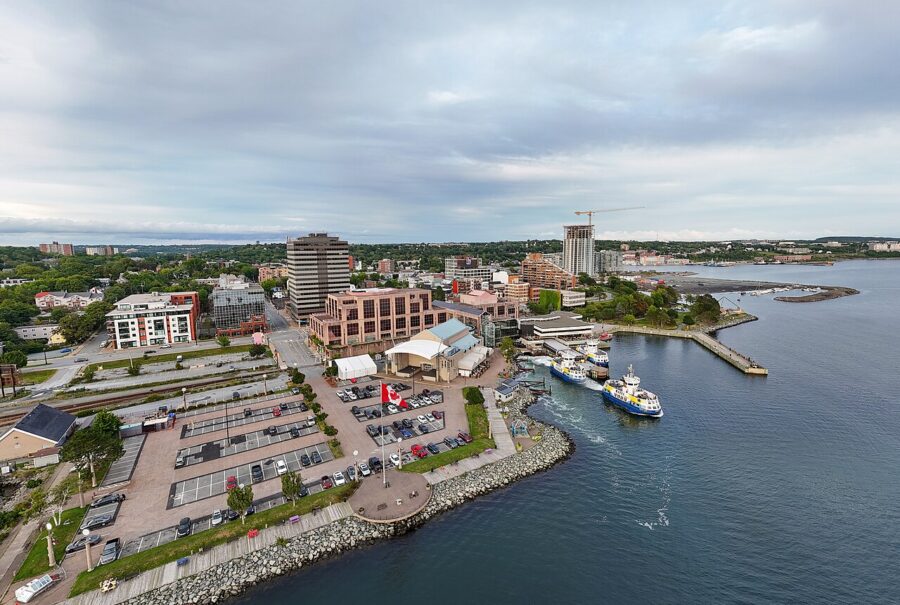 Aerial view of Dartmouth Halifax Panorama, showcasing the city's colorful buildings and coastal landscape.
