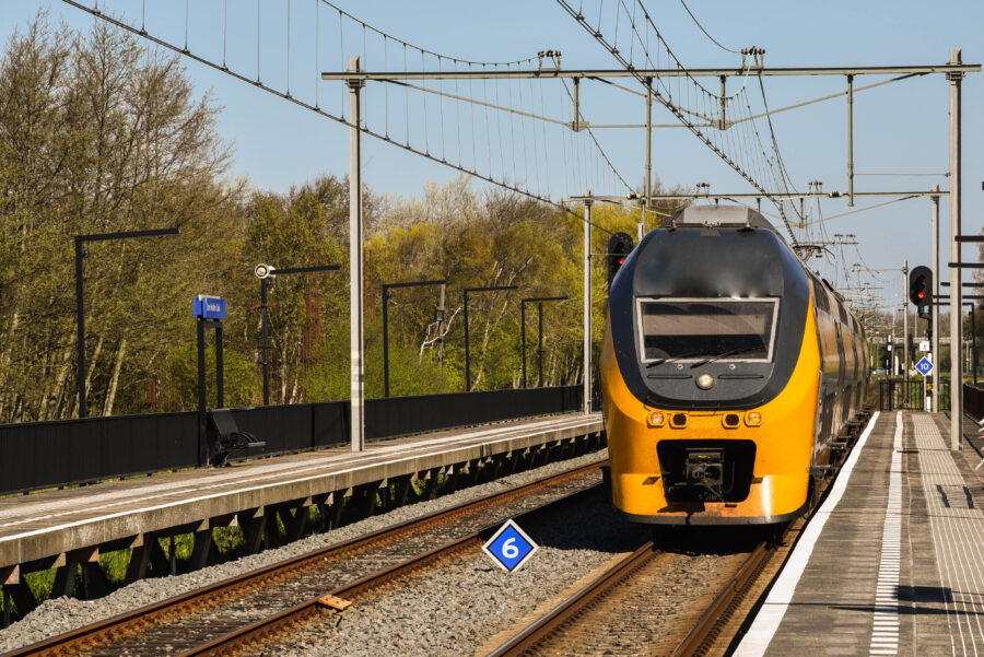 Train travels by the Den Helder station, highlighting the Dutch railway network in the coastal city of Den Helder.