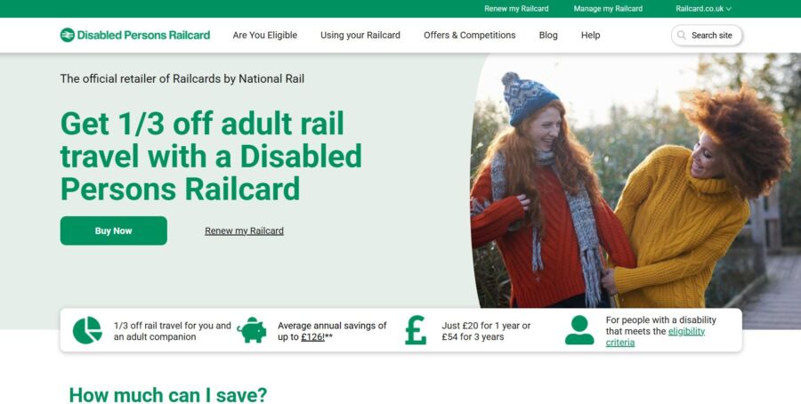 Website banner for Disabled Persons Railcard, offering 1/3 off adult rail travel. Two smiling women in cozy outfits, set in a sunny outdoor scene.