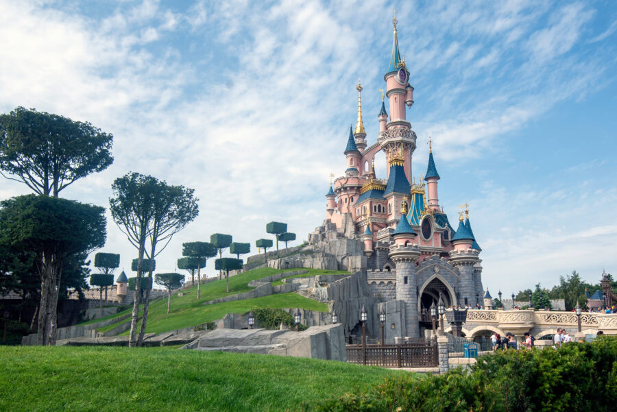The iconic Sleeping Beauty Castle in Disneyland Paris, showcasing its whimsical architecture