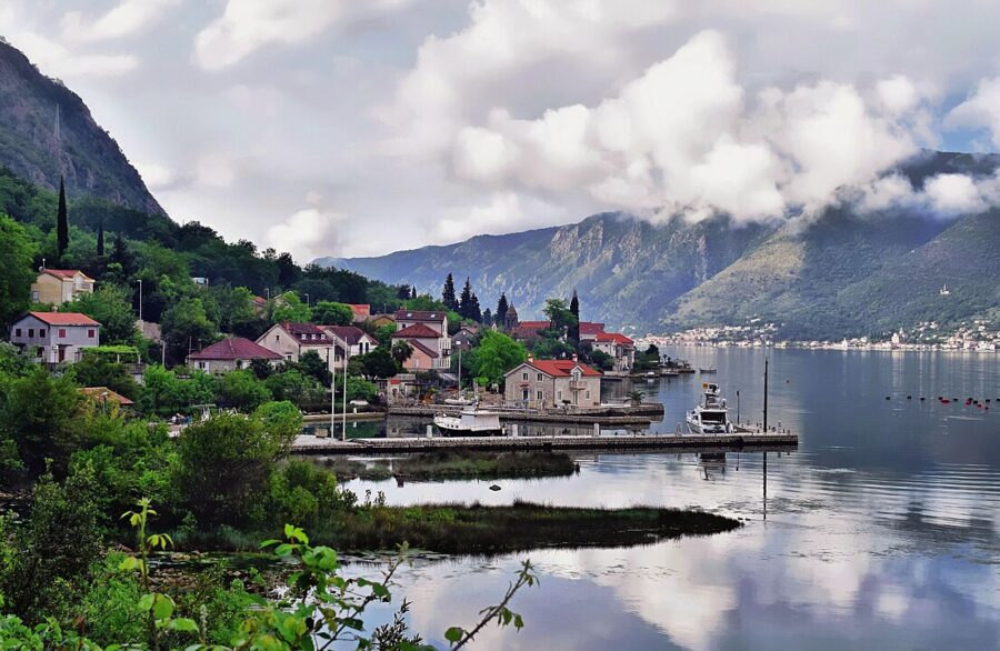 Scenic view of Dobrota, a charming town nestled along the tranquil shores of Lake Kotor.