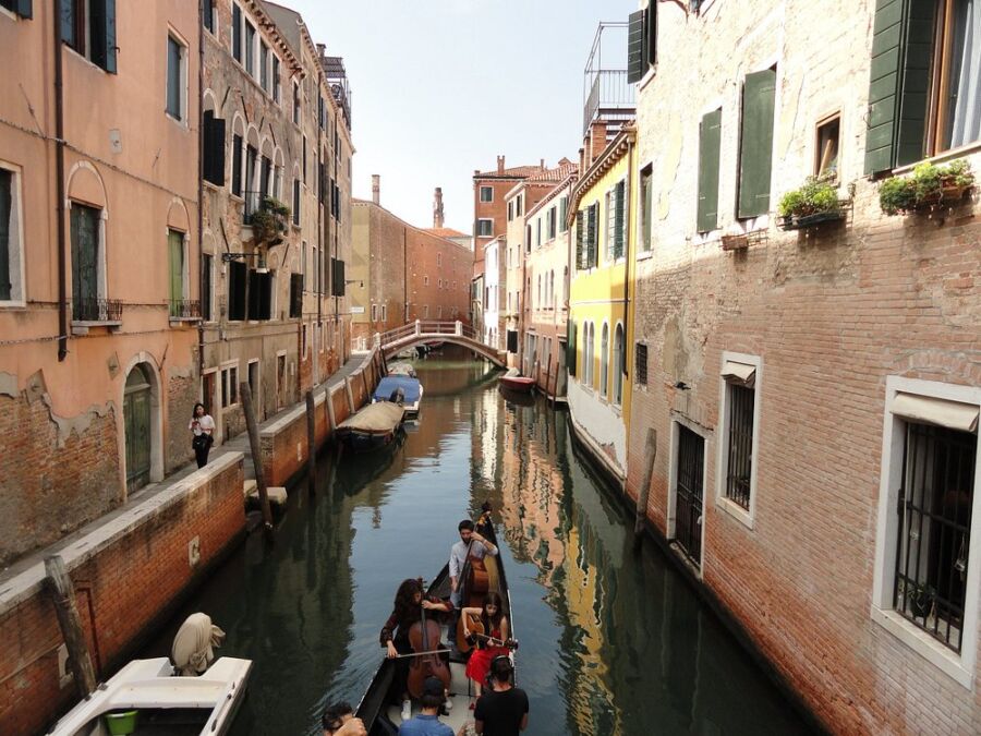 Tourists on a gondola ride at Dorsoduro