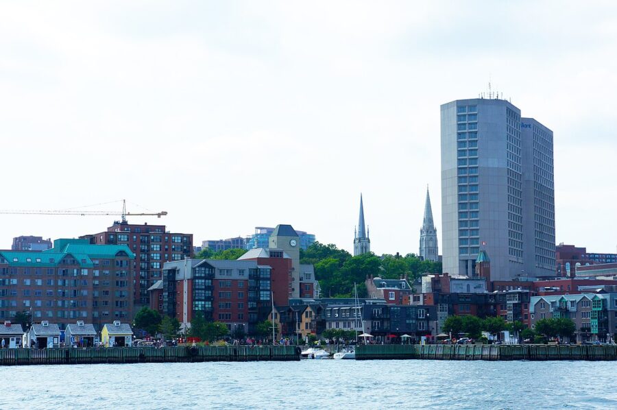 Scenic view of Downtown Halifax, Nova Scotia, from the water, showcasing the city's skyline and waterfront.