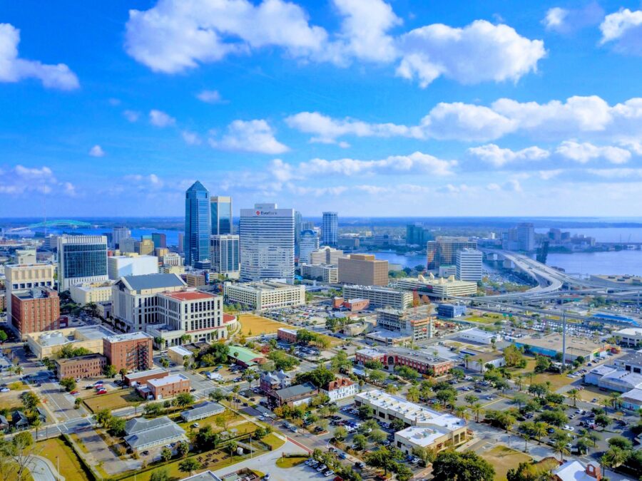Downtown Jacksonville skyline featuring modern skyscrapers against a clear blue sky