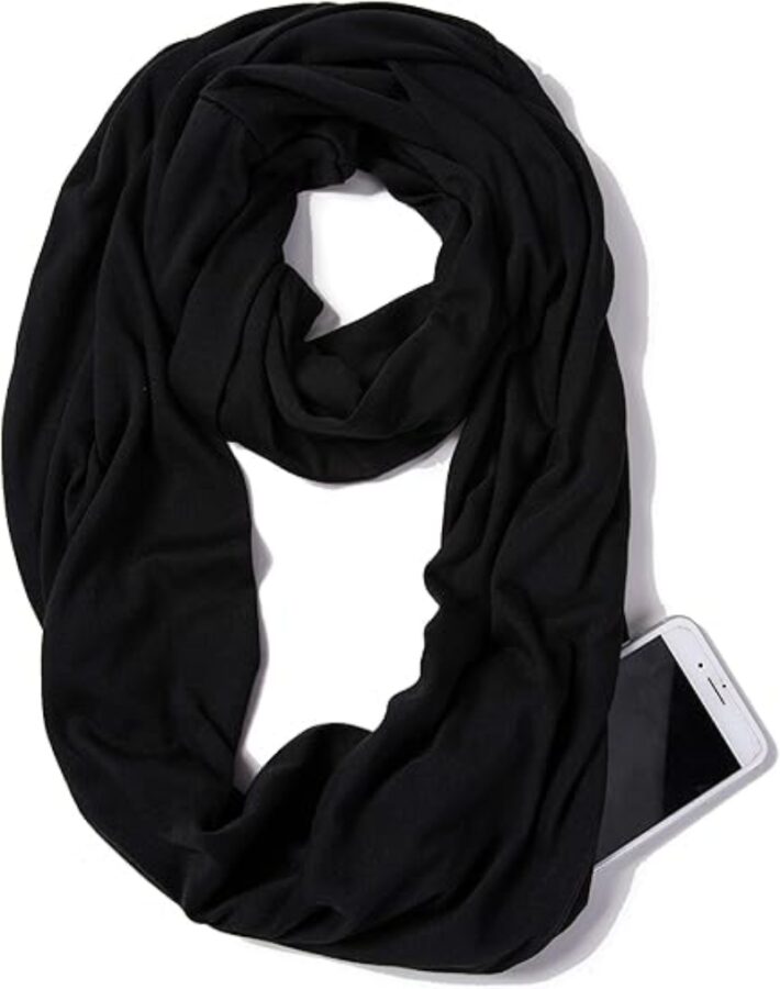 Black Elzama Infinity Travel Scarf displayed against a solid black background, highlighting its sleek design.
