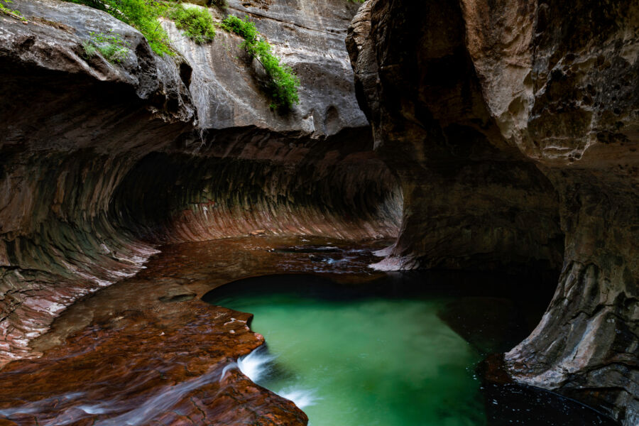 Scenic view of Emerald Pools Trail in Zion National Park, showcasing lush greenery and stunning rock formations