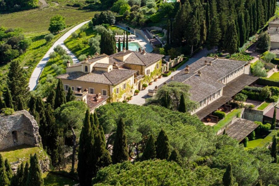 Luxurious Mediterranean estate with garden, pool, and scenic countryside views.