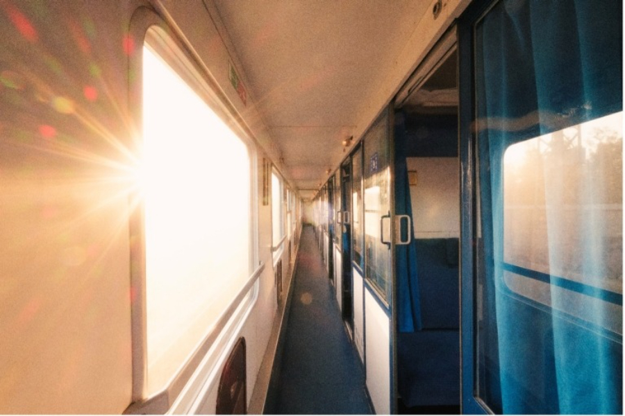 Interior hallway of the European Sleeper train, featuring sleek decor and accessible pathways for passengers.
