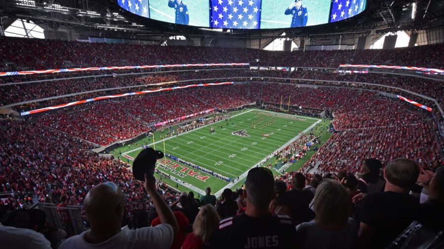 Atlanta Falcons fans crowd Mercedes-Benz Stadium for a thrilling home football game experience.