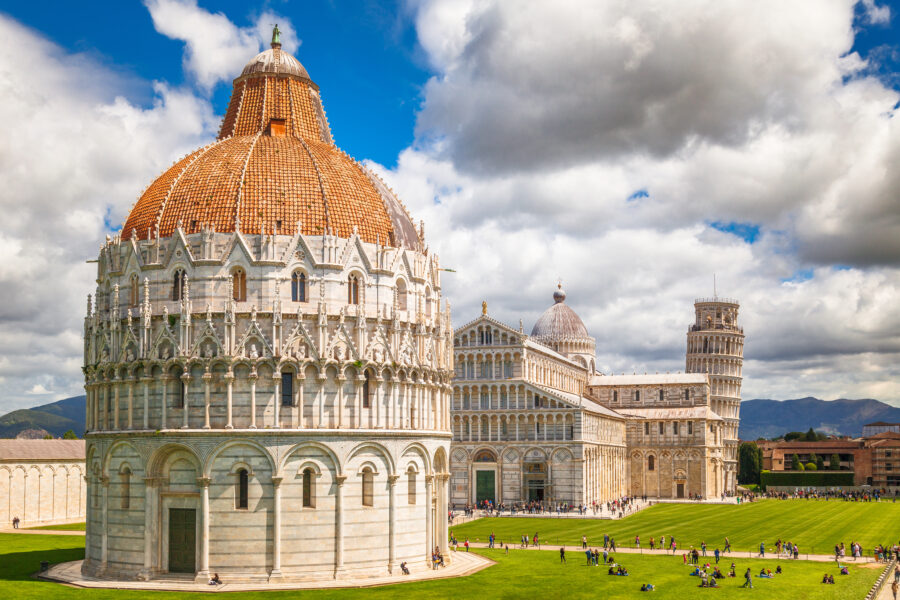 The sunny Square of Miracles features the Pisa Baptistery, Cathedral, and Leaning Tower, showcasing Tuscany's architectural beauty