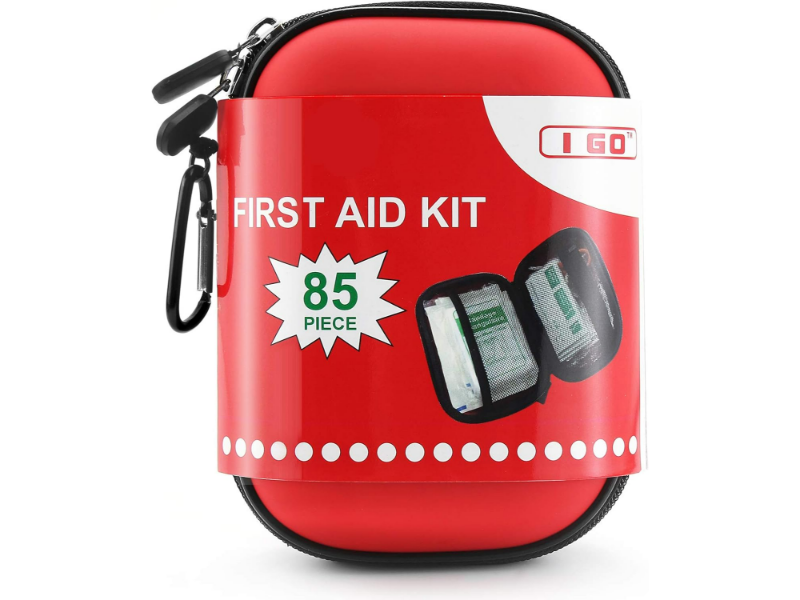Compact red first aid kit, 85 pieces, I GO brand, with portable strap and zipper closure.