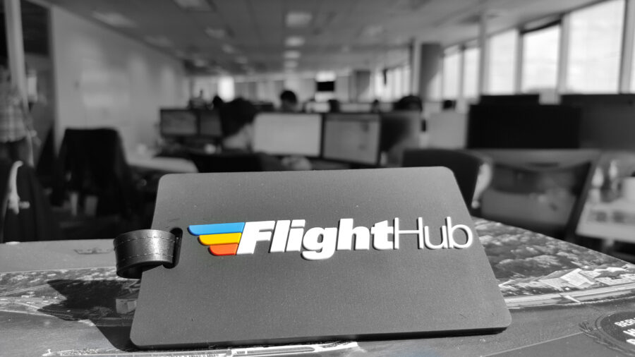 FlightHub office sign: modern branding and dynamic travel workspace.