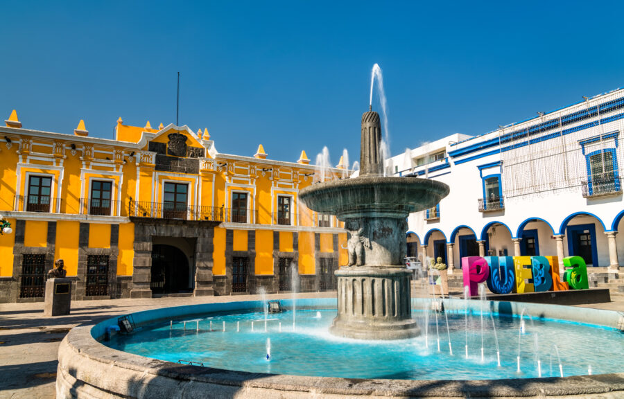 The fountain and the main theater in Puebla, Mexico, form an impressive backdrop in the city center