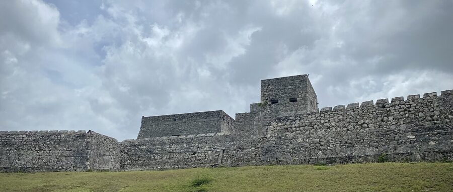 Fuerte de San Felipe de Bacalar features sturdy stone and grass walls, showcasing its historical architecture in Quintana Roo, Mexico.
