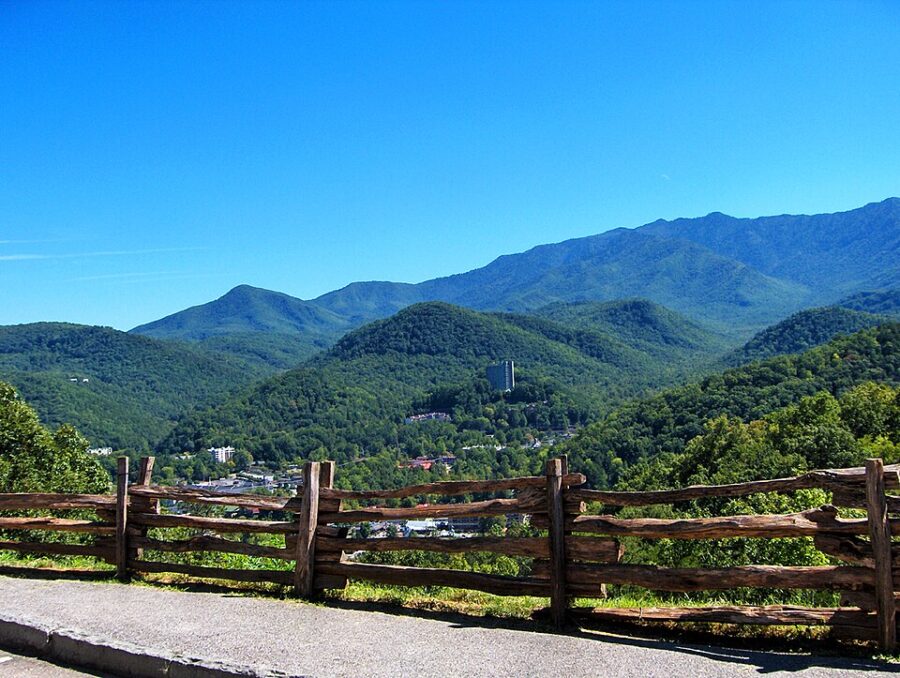 Wooden fence at Gatlinburg Overlook, providing a rustic border to the picturesque mountain scenery.