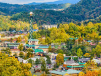 Scenic view of Gatlinburg, Tennessee, showcasing the town's charming buildings and surrounding mountains.