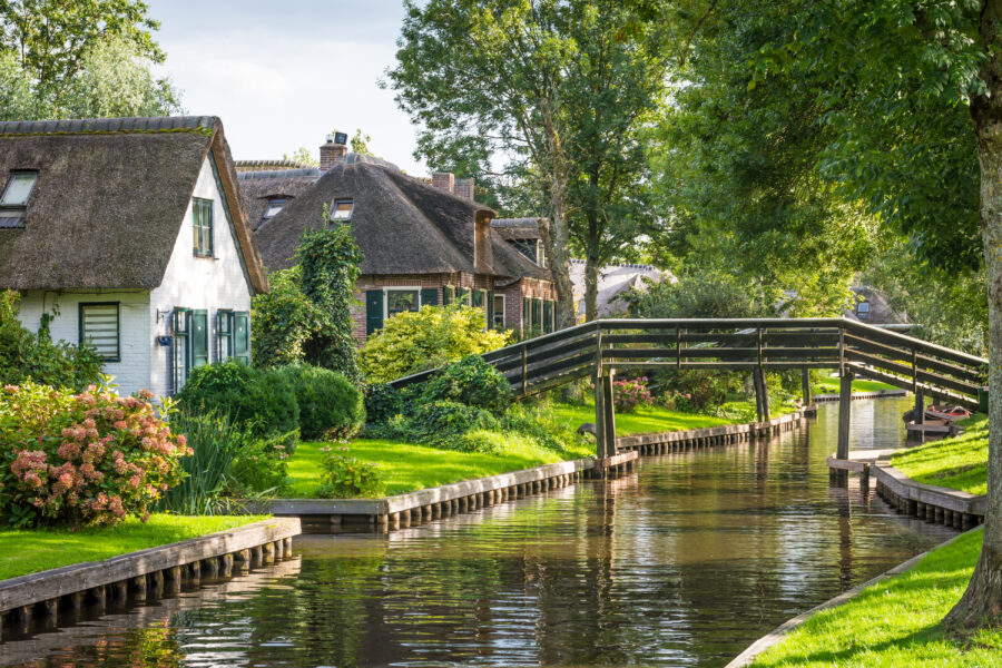 Charming canals and thatched-roof houses create a scenic view of Giethoorn's historic old town