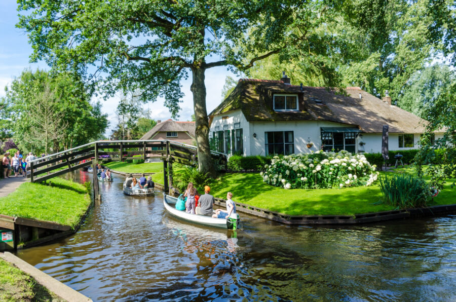 Giethoorn village in the Netherlands features picturesque canals and charming thatched-roof homes, often called the "Venice of the North."
