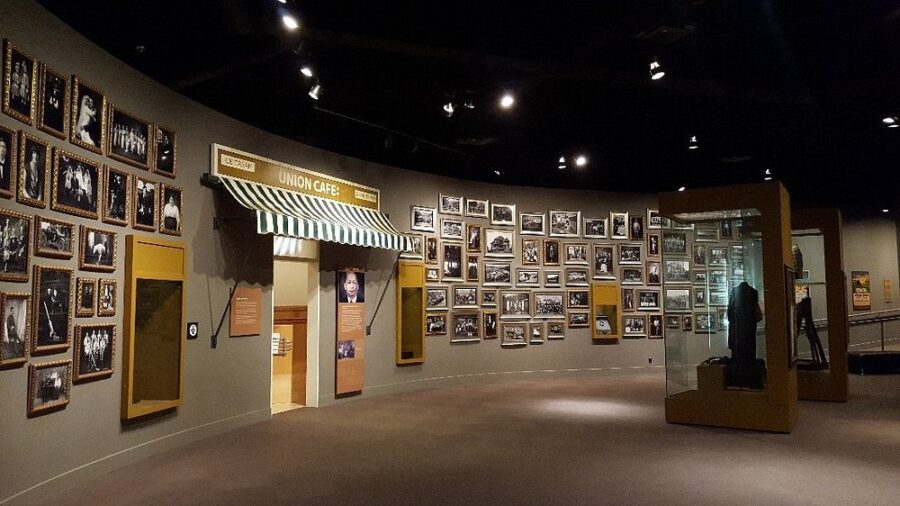 Glenbow Museum in Calgary, Canada, showcasing a variety of pictures on display in a spacious gallery setting.
