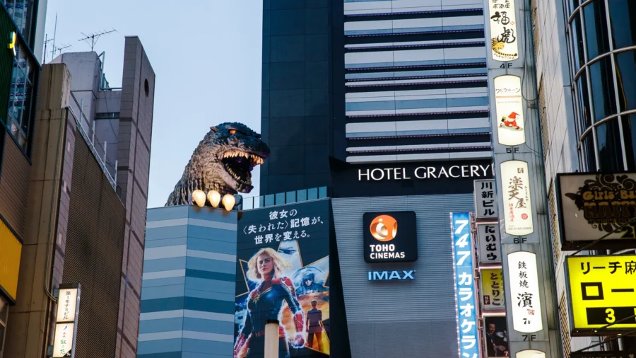 Godzilla head atop Hotel Gracery rooftop, Shinjuku Tokyo; Toho Cinemas, IMAX and neon signs.