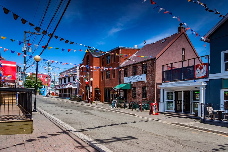 Exterior view of a building featuring a red awning on George Street, St. John’s, Newfoundland, Canada.