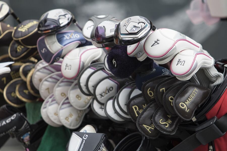 golf clubs arranged