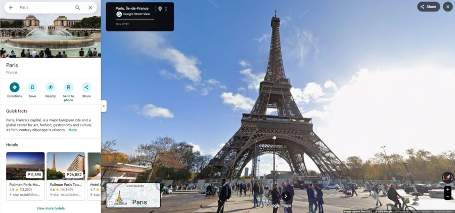 Google Maps Street View image of the Eiffel Tower in Paris, showcasing its iconic structure against a clear blue sky.
