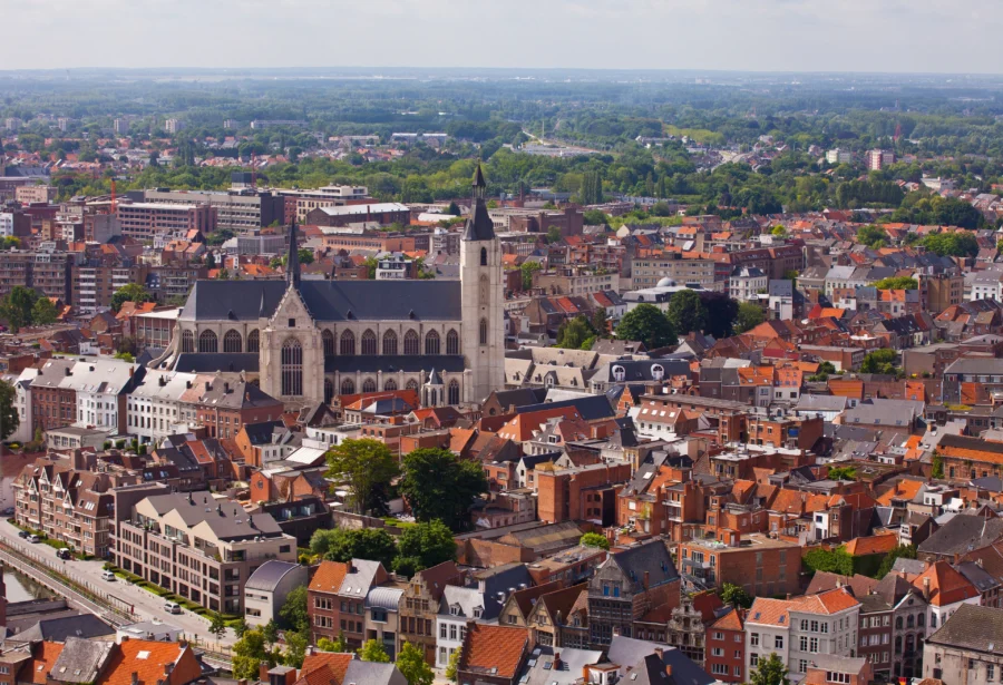Mechelen aerial view with Gothic cathedral, red-tiled roofs, and historic city center.