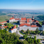 Scenic view of Göttweig Abbey above the Danube Valley, showcasing its architecture against a backdrop of rolling hills