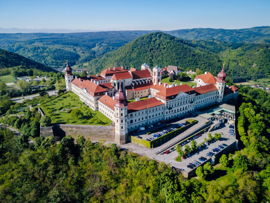 Panoramic view of Göttweig Abbey above the Danube Valley highlighting its architecture amid rolling hills