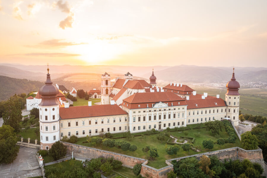 Aerial view of Göttweig Abbey in Wachau, Lower Austria, showcasing its baroque architecture and lush green surroundings