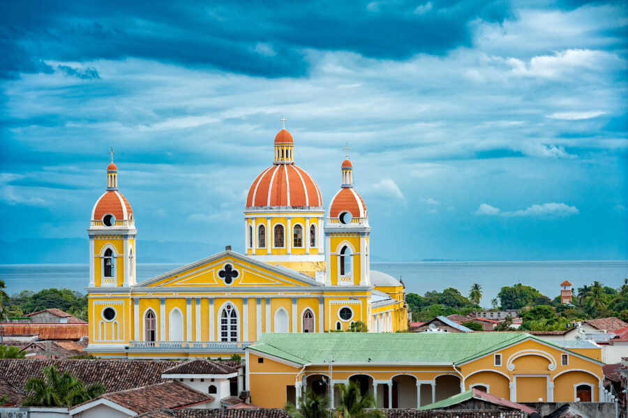 Rooftop view of the Cathedral of Granada with Lake Nicaragua shimmering in the background